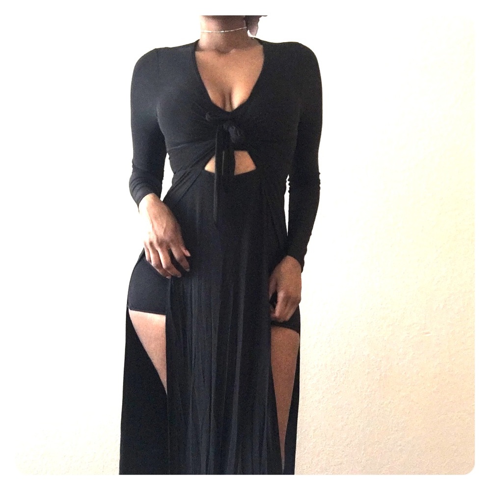 Floor length black dress.